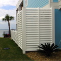 8ft high Louvers covering equipment, steps down to 4ft high, 2x6 inch uprights with 0.75in gap